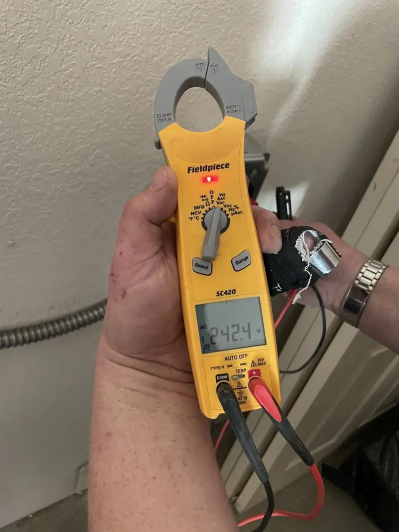 Voltage testing with clamp meter during Generator Installation in Palmyra